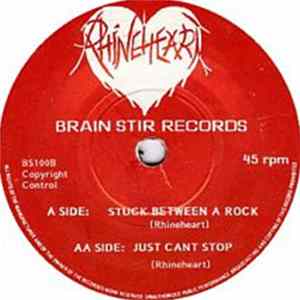Rhineheart - Stuck Between A Rock FLAC
